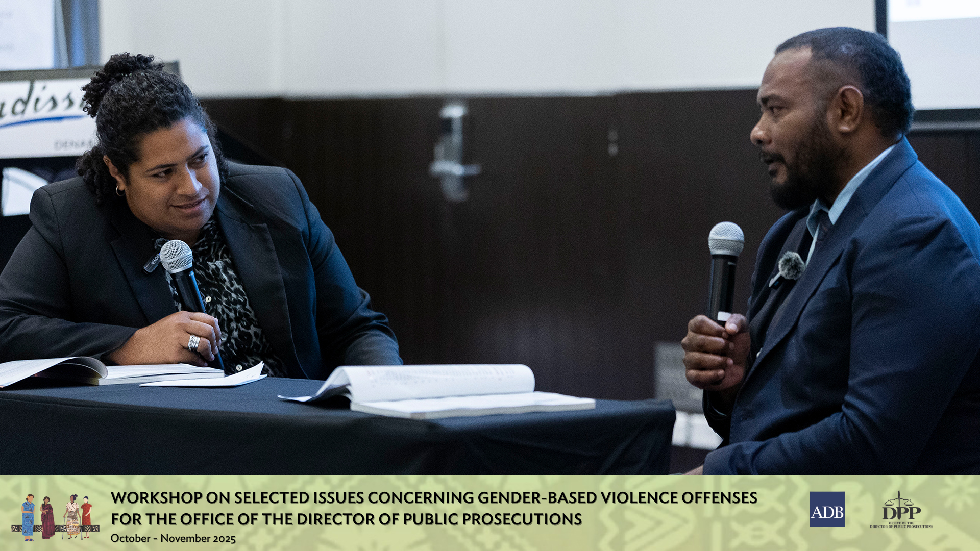 Participants discussing their tasks during an activity in the workshop