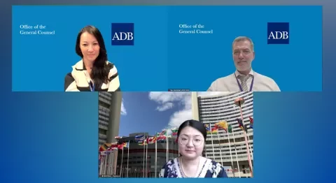 Photo: ADB's Angelia Chia and Ben Sandstad, and UNCITRAL's Yanying Li discussing NCDs with ADB staff